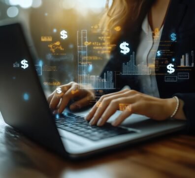 Businesswoman uses laptop for cost reduction. Financial analysis, data visualization on screen. Graphic overlay shows cost saving measures. Possible scenarios include budget planning expense