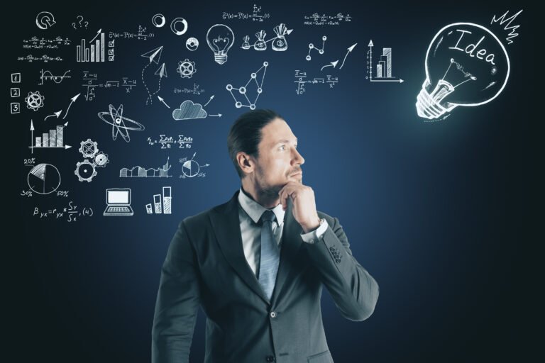 Success and technology concept. Portrait of attractive thoughtful young businessman standing on dark wall background with business sketch